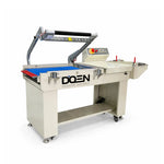 Selladora en L semiautomática DOEN DBS-450LS con banda azul.